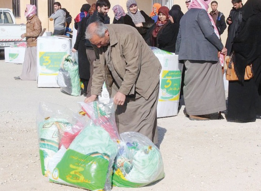 «الحملة الوطنية السعودية» 
توزع 14 ألف قطعة شتوية 
على الأسر السورية