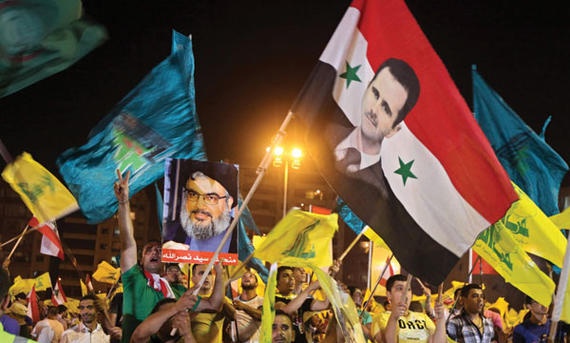 "علماء المسلمين" : "حزب الله" منظمة إرهابية تذكي الفتنة وتستبيح الدماء