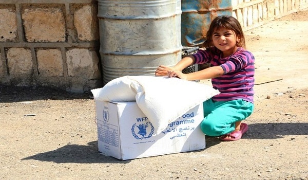 برنامج الأغذية ينجح للمرة الأولى في إلقاء مساعدات غذائية لدير الزور السورية