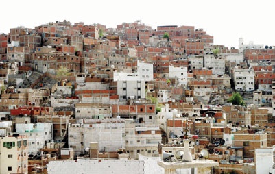 إبعاد العمالة من الأحياء الشعبية يخفض أسعار عقاراتها 30 %