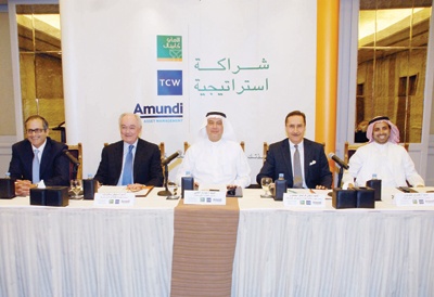 «الأهلي كابيتال» تعلن عن تحالف استراتيجي مع TCW و AMUNDI