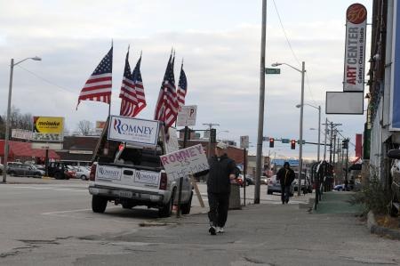 قصة مصورة : أوباما يهنئ رومني على الحملة الانتخابية "المفعمة بالحماس"