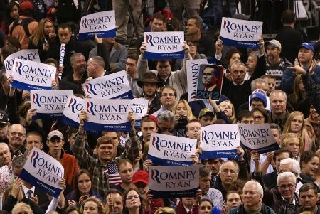 قصة مصورة : أوباما يهنئ رومني على الحملة الانتخابية "المفعمة بالحماس"