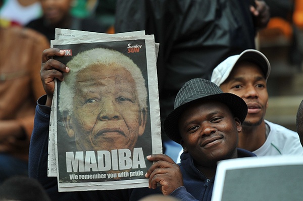 قصة مصورة :مانديلا يجمع العالم في تأبينه