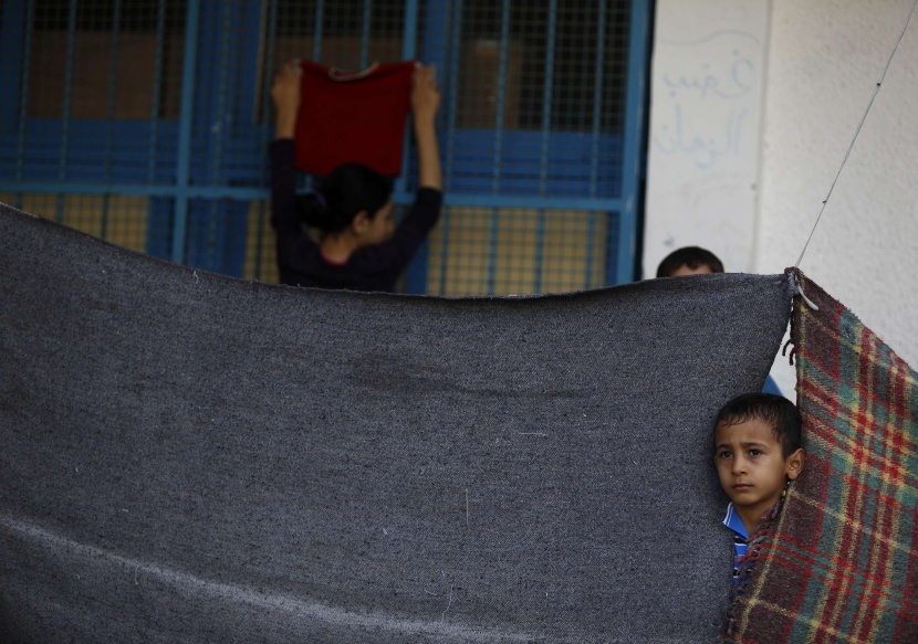 قصة مصورة: الفلسطينيون يواجهون الهمجية الإسرائيلية