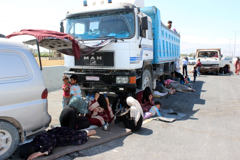 قصة مصورة: نازحو سوريا .. بين نار اللجوء وجحيم الأسد
