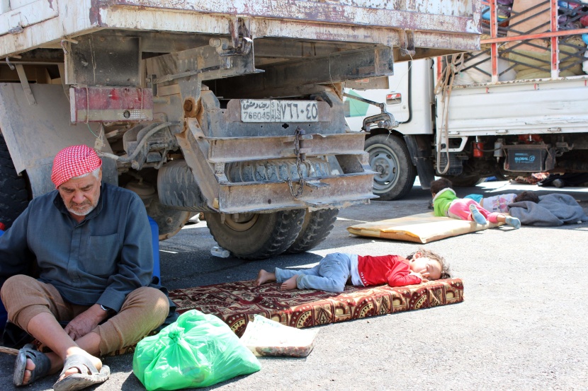 قصة مصورة: نازحو سوريا .. بين نار اللجوء وجحيم الأسد