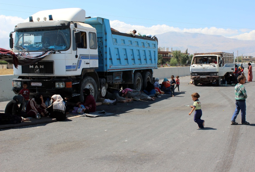 قصة مصورة: نازحو سوريا .. بين نار اللجوء وجحيم الأسد