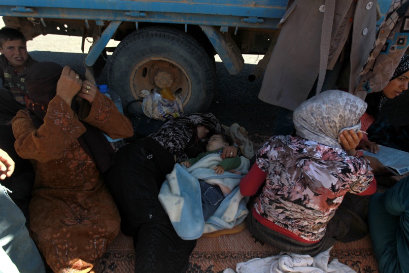 قصة مصورة: نازحو سوريا .. بين نار اللجوء وجحيم الأسد