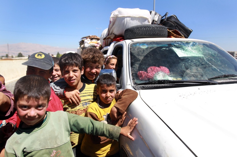 قصة مصورة: نازحو سوريا .. بين نار اللجوء وجحيم الأسد