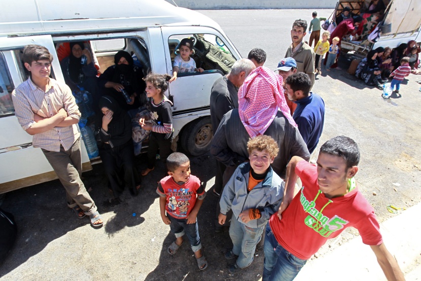 قصة مصورة: نازحو سوريا .. بين نار اللجوء وجحيم الأسد