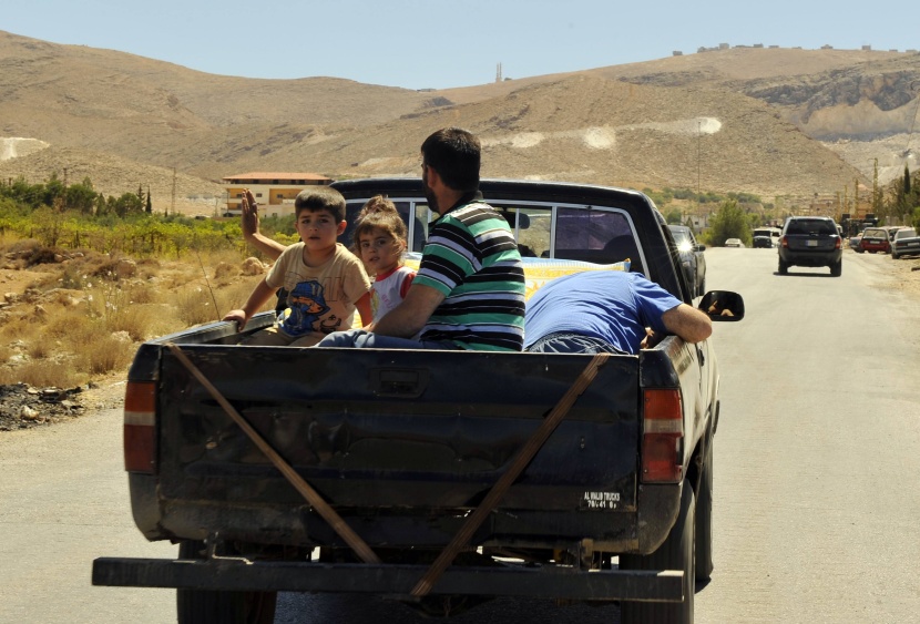 قصة مصورة: نازحو سوريا .. بين نار اللجوء وجحيم الأسد