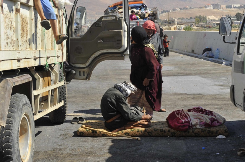 قصة مصورة: نازحو سوريا .. بين نار اللجوء وجحيم الأسد