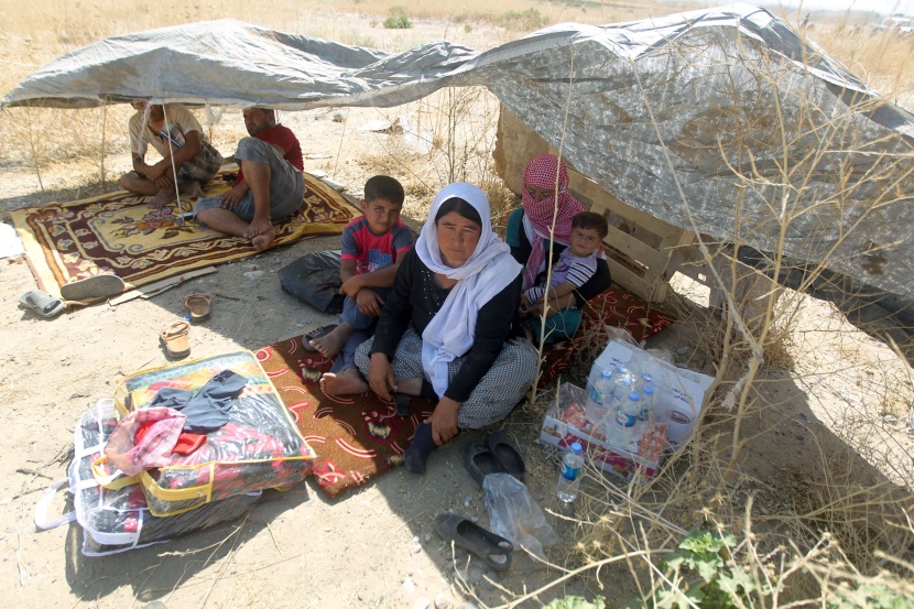 قصة مصورة : نازحون عراقيون أبعدتهم الإضطرابات