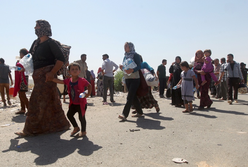 قصة مصورة : نازحون عراقيون أبعدتهم الإضطرابات