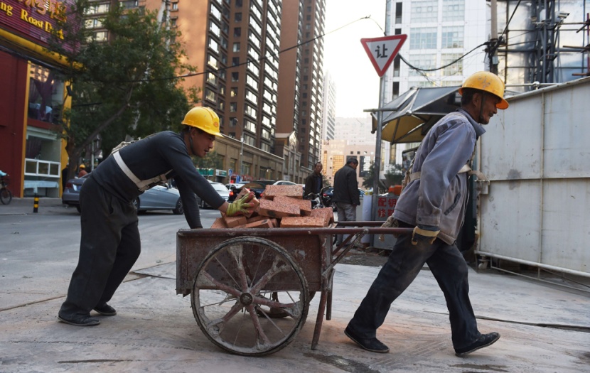 إحراق عمال في الصين في نزاع على الأرض مع مزارعين