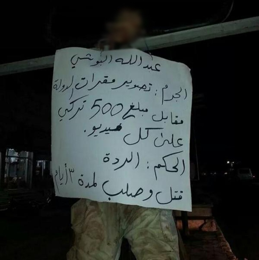 داعش تعدم شابا لتصويره مقار التنظيم