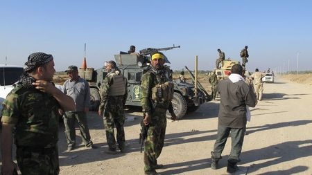 مقاتلون أكراد عراقيون ينضمون للقتال ضد داعش في كوباني