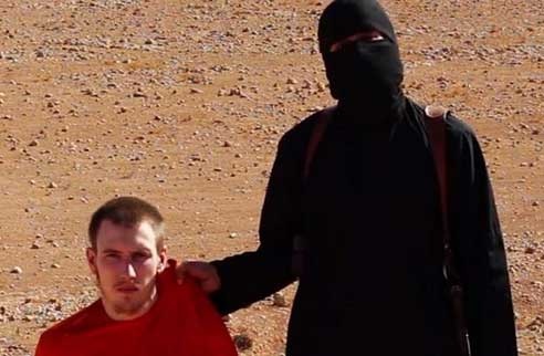 'تنظيم الدولة' الإرهابي يعلن قتل الرهينة الأمريكي 'بيتر كاسيغ' وأوباما يصف إعدامه بالشر المطلق