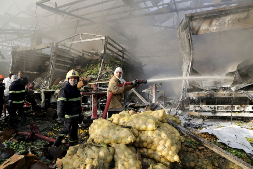 قصة مصورة: مقتل وإصابة العشرات في انفجار شاحنة مفخخة في بغداد