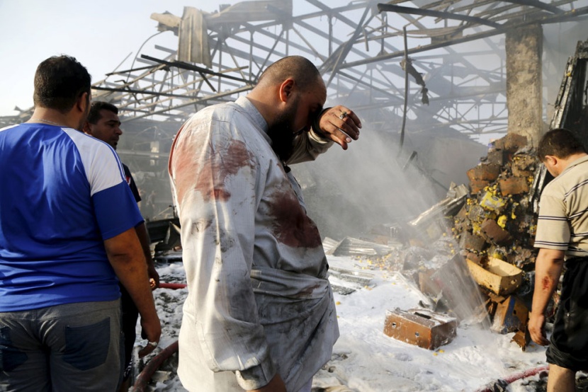 قصة مصورة: مقتل وإصابة العشرات في انفجار شاحنة مفخخة في بغداد