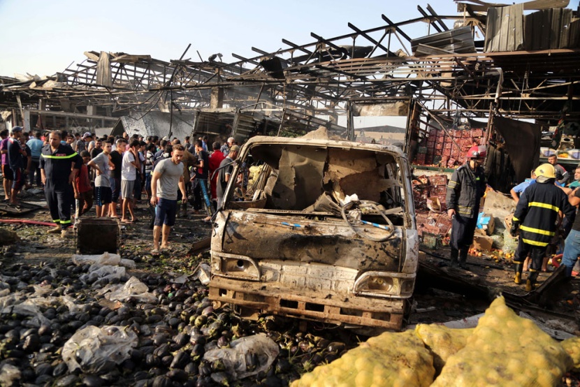 قصة مصورة: مقتل وإصابة العشرات في انفجار شاحنة مفخخة في بغداد