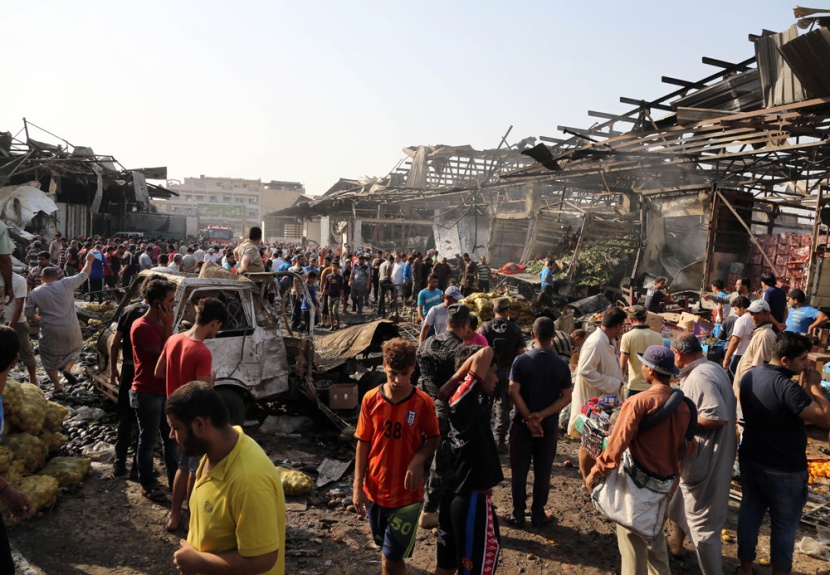 قصة مصورة: مقتل وإصابة العشرات في انفجار شاحنة مفخخة في بغداد