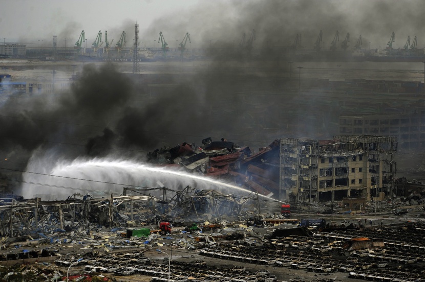 قصة مصورة: ارتفاع حصيلة قتلى انفجارات مدينة تيانجين الصينية إلى 104 شخصاً