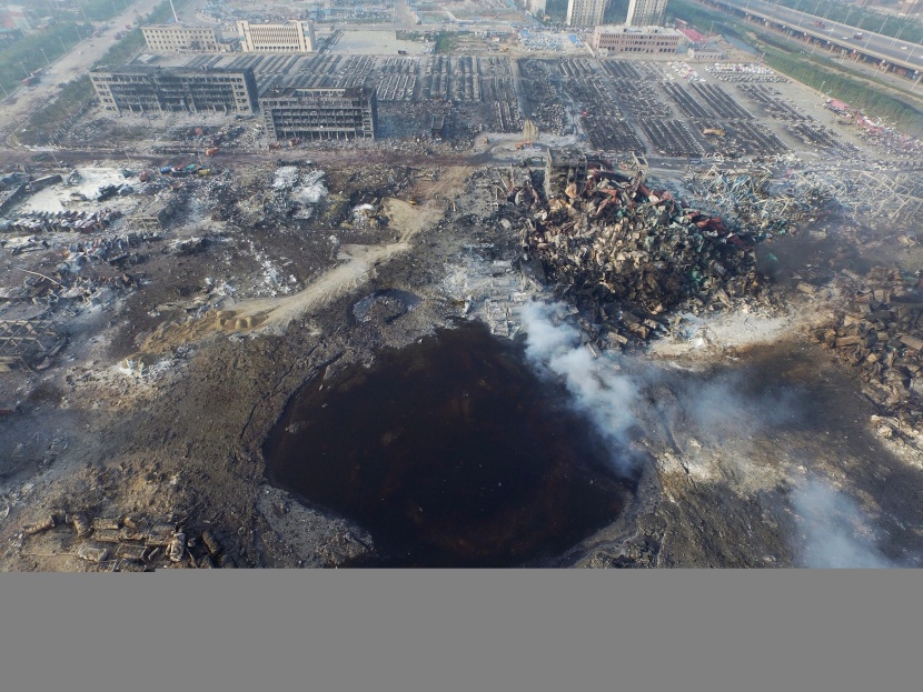 قصة مصورة: ارتفاع حصيلة قتلى انفجارات مدينة تيانجين الصينية إلى 104 شخصاً