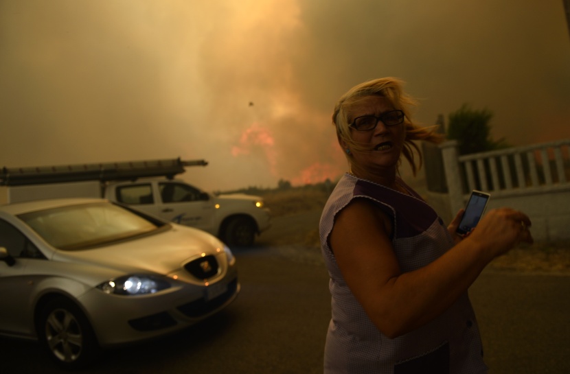 قصة مصورة: إجلاء آلاف الأشخاص في إسبانيا بسبب حرائق الغابات