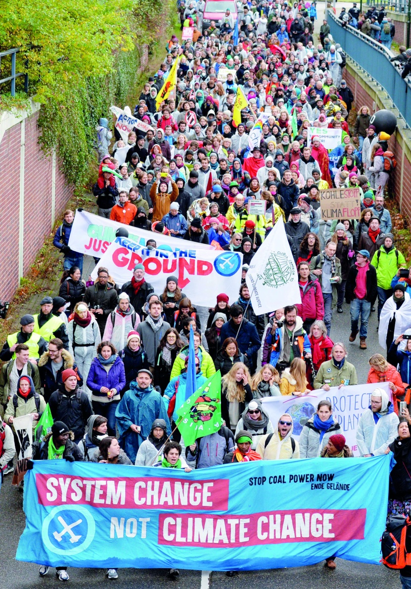 نشطاء بيئيون يطالبون بمنع استخدام الفحم ومكافحة التغير المناخي في بون