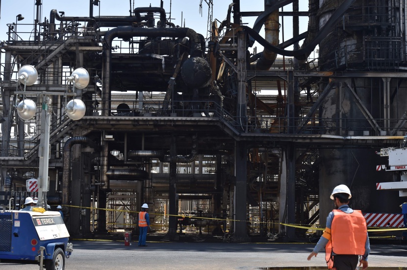 قصة مصورة : وفد من الصحافة العالمية يزور معامل بقيق وخريص 