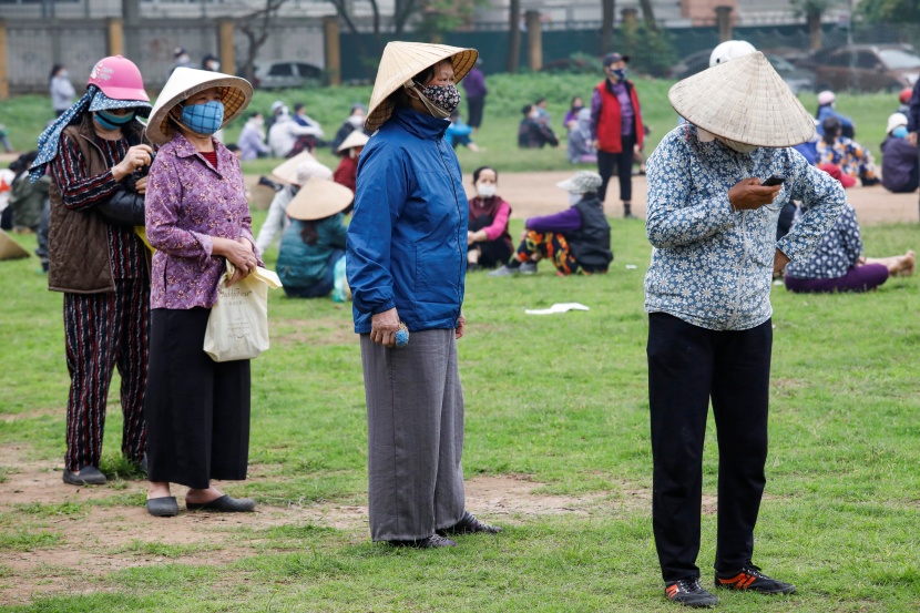  توزيع حصص غذائية في فيتنام للمتضررين من توقف الأعمال 
