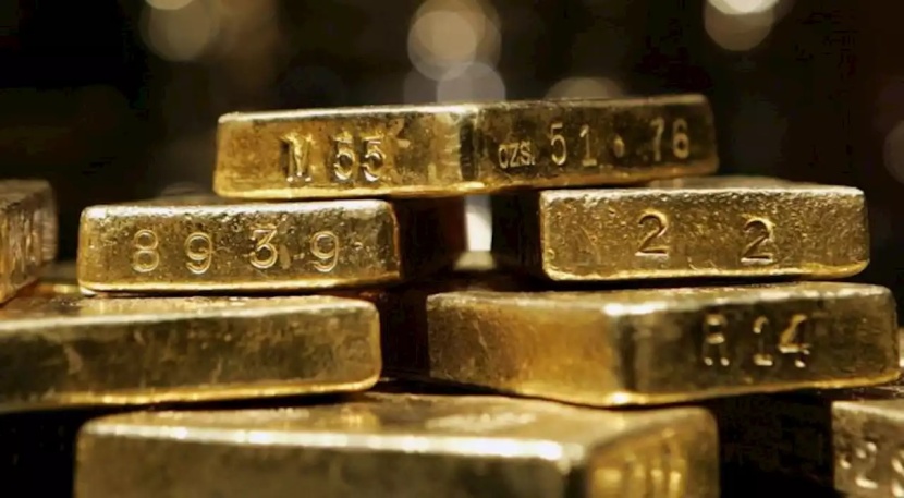 الذهب يهبط بفعل ارتفاع الدولار قبيل بيانات التضخم الأمريكية