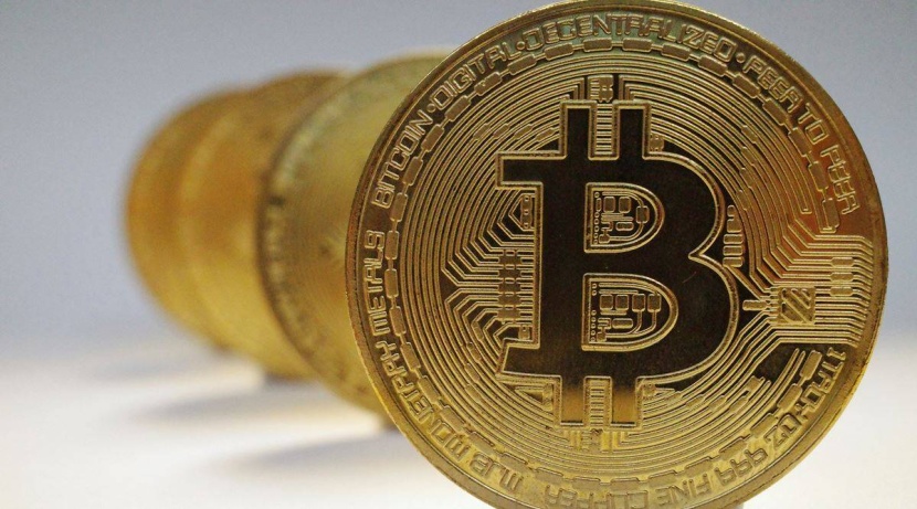 موظف يسرق 154 مليون دولار ويحولها إلى عملات بيتكوين