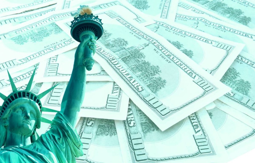 الارتفاع السريع للدولار يزيد المخاطر على الاقتصاد العالمي