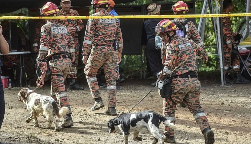 شرطة ماليزيا تحقق بعد مقتل 24 شخصا في انهيار أرضي