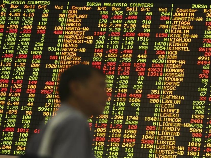 السجن 56 عاما للعقلين المدبرين لأكبر تلاعب بسوق الأسهم في سنغافورة 