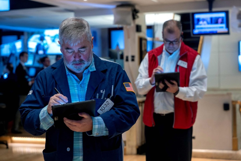 وول ستريت تصعد بعد تعزيز تعليقات باول آمال خفض الفائدة خلال 2024